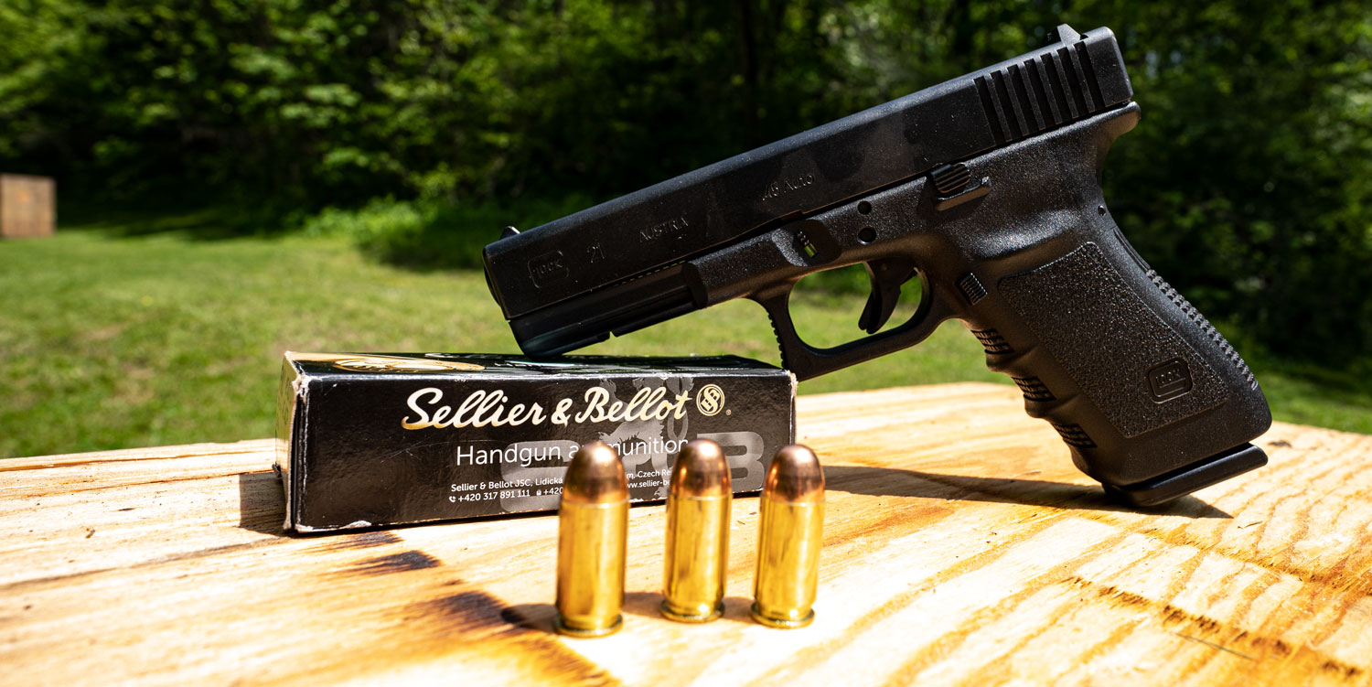 45 ACP Glock with ammunition at the shooting range