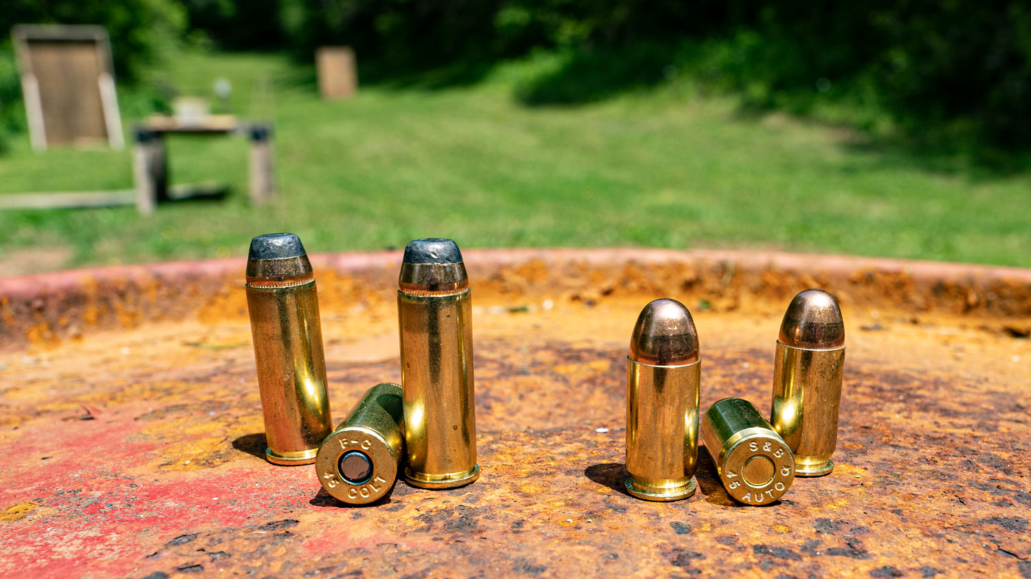 45 LC and 45 ACP ammo side by side