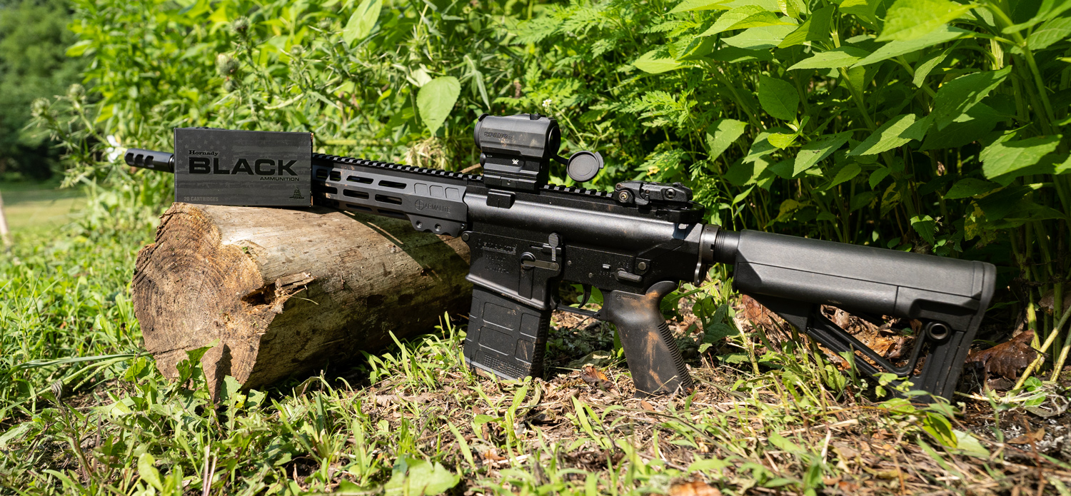 Armalite AR-10 rifle with 308 ammo on display at a shooting range