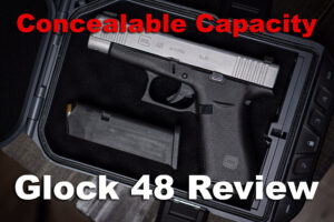 Glock 48 pistol with magazine in travel case used for a review