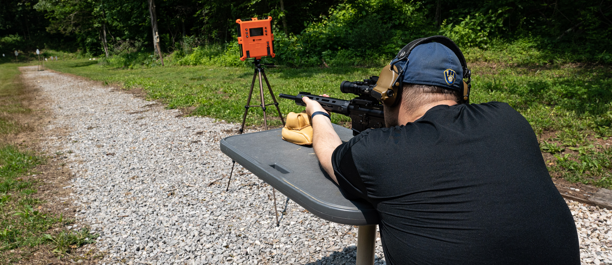 Firing a 6.5 Grendel rifle at a shooting range