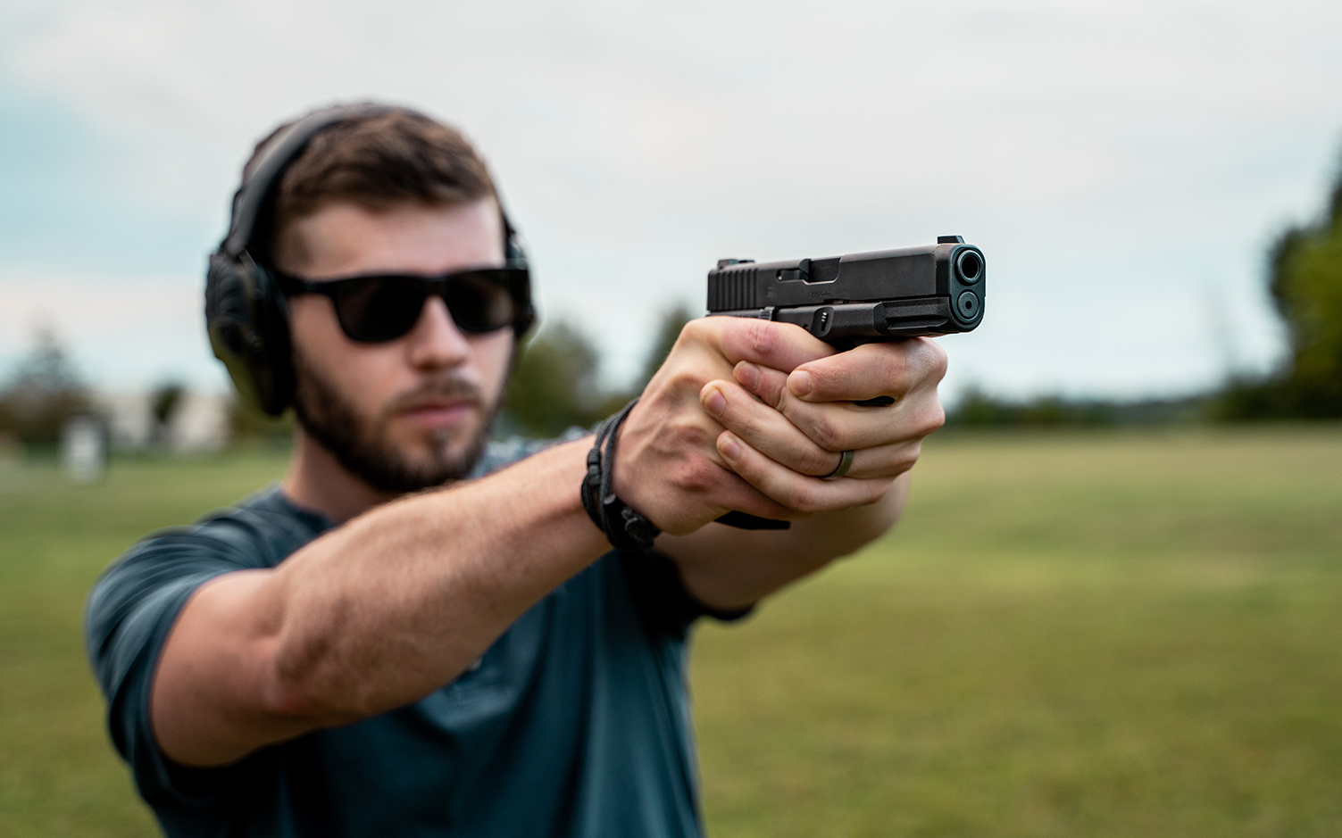 Shooting a pistol at the range