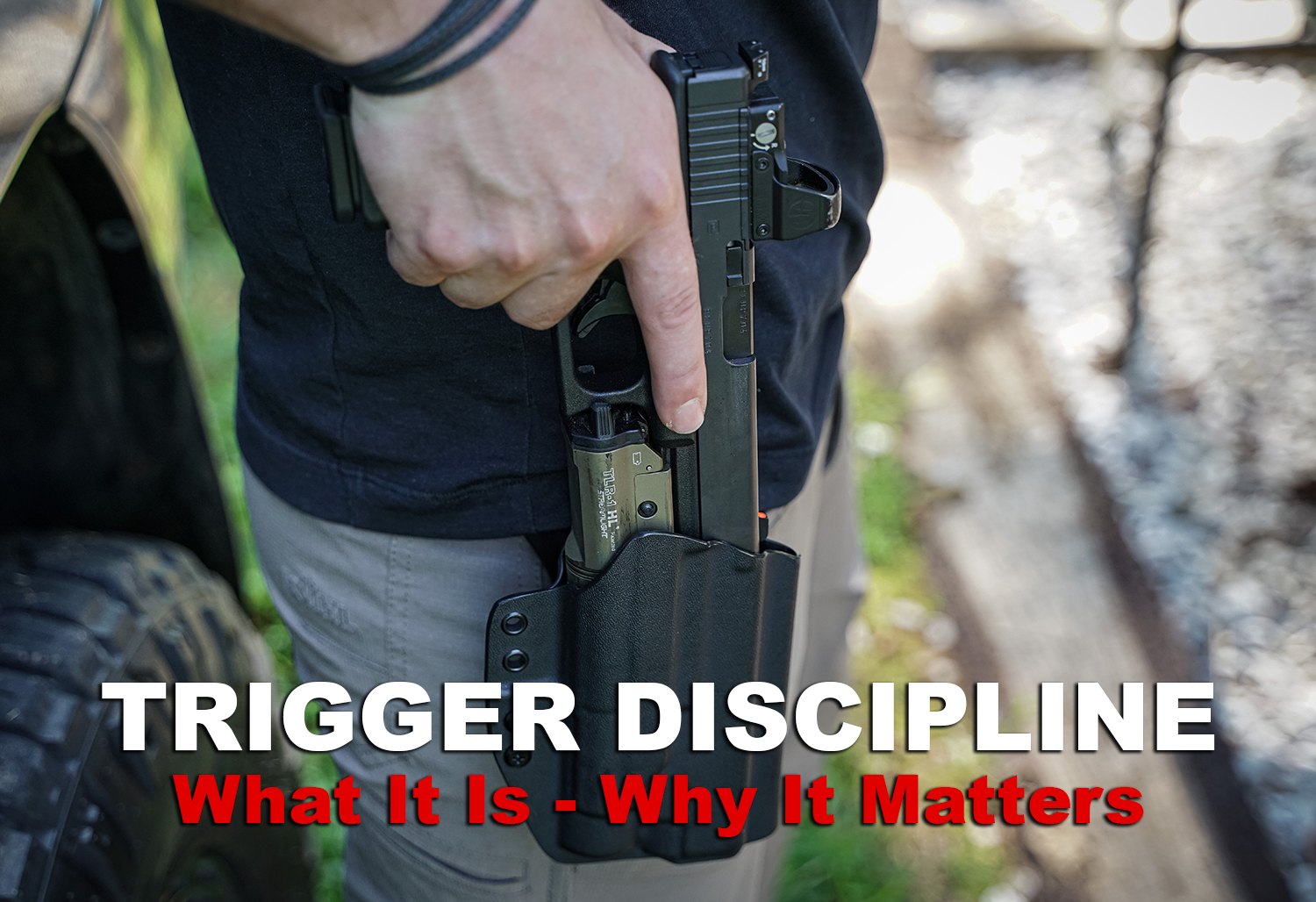 Trigger discipline demonstrated with pistol in holster